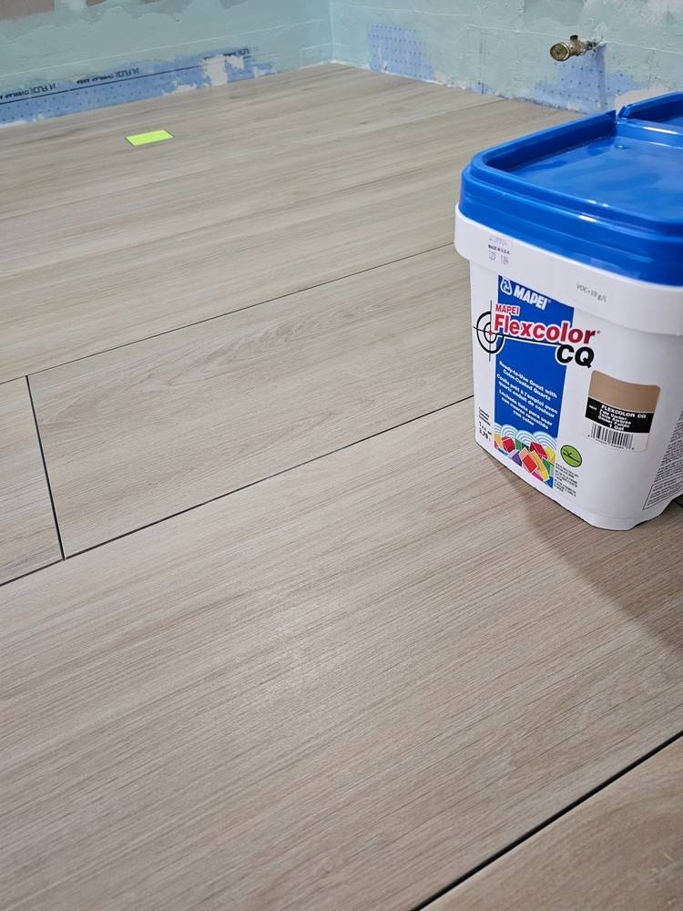 Wood-look floor tile installation — bathroom renovation Barrington