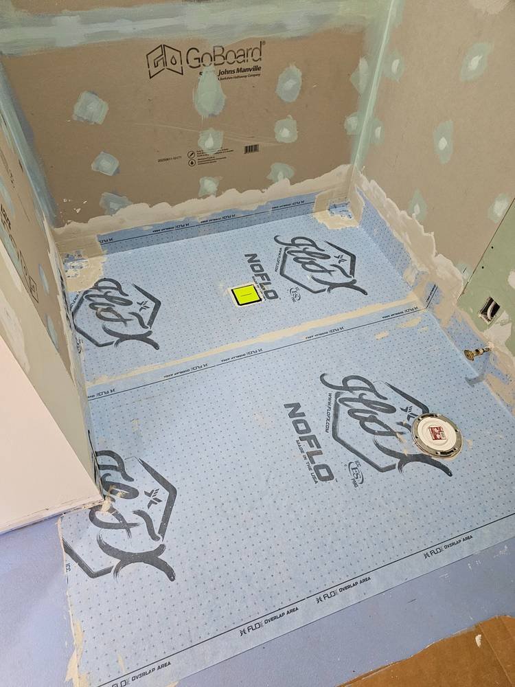 Laser level tile layout — precision bathroom remodeling Barrington IL