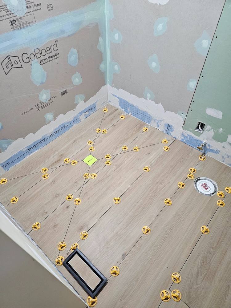 Shower niche tile in progress — bathroom remodel Barrington IL
