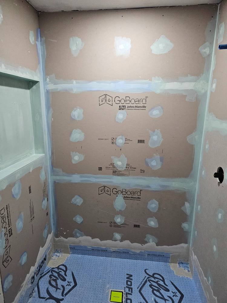 Wall tile installation in progress — bathroom renovation Barrington IL