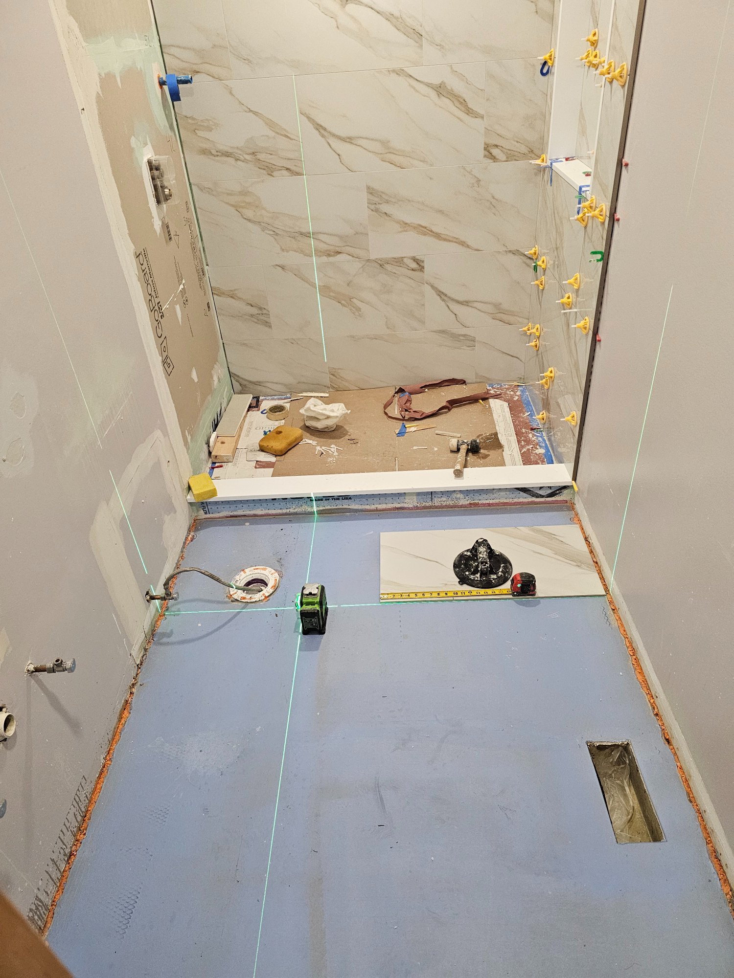 Shower walls tiled, bathroom floor prep with laser level — Inverness IL