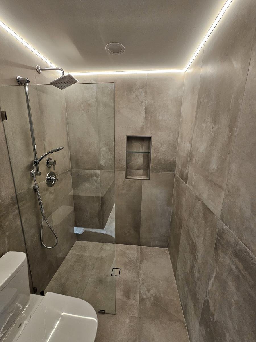 Walk-in shower tile work Lake Zurich IL — floor-to-ceiling large-format tile installation
