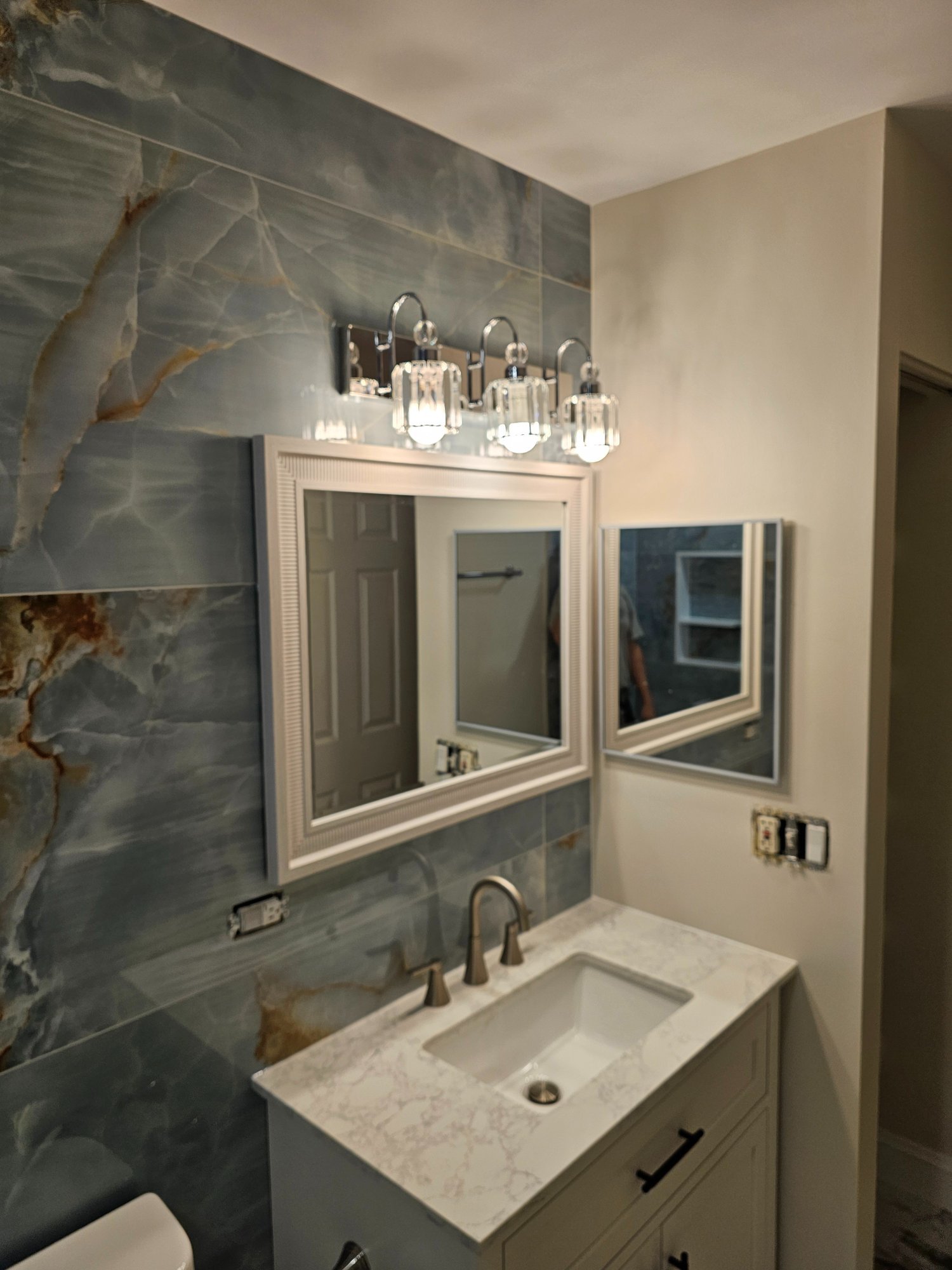 Tub surround detail with blue onyx tile — Schaumburg IL bathroom