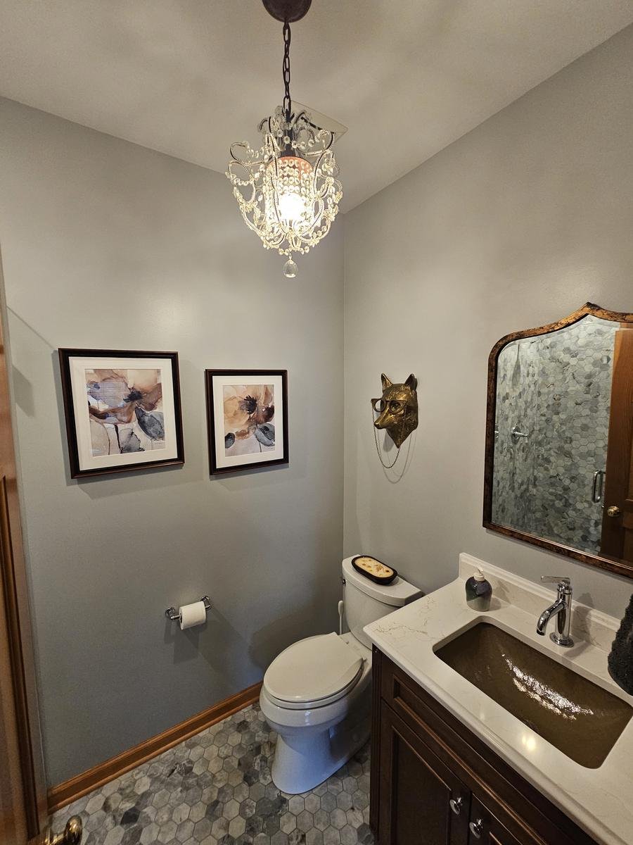 Walk-in shower bathroom remodel Schaumburg IL — custom tile work and frameless glass enclosure