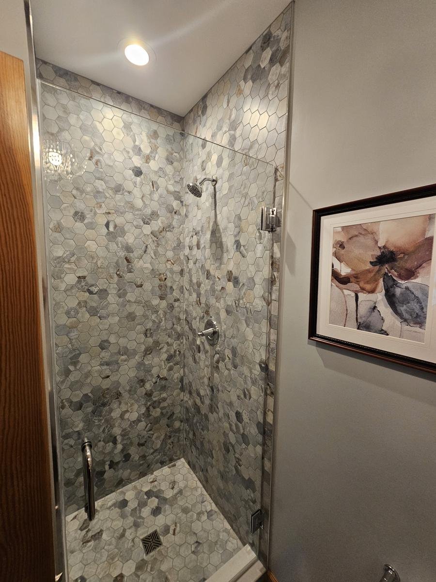 Bathroom renovation Schaumburg IL — full walk-in shower with floor-to-ceiling tile installation