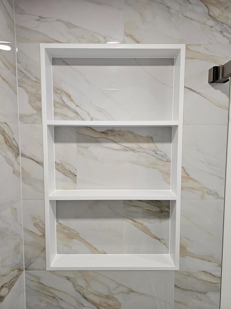Custom shower niche with Calacatta marble — Inverness IL luxury bathroom renovation