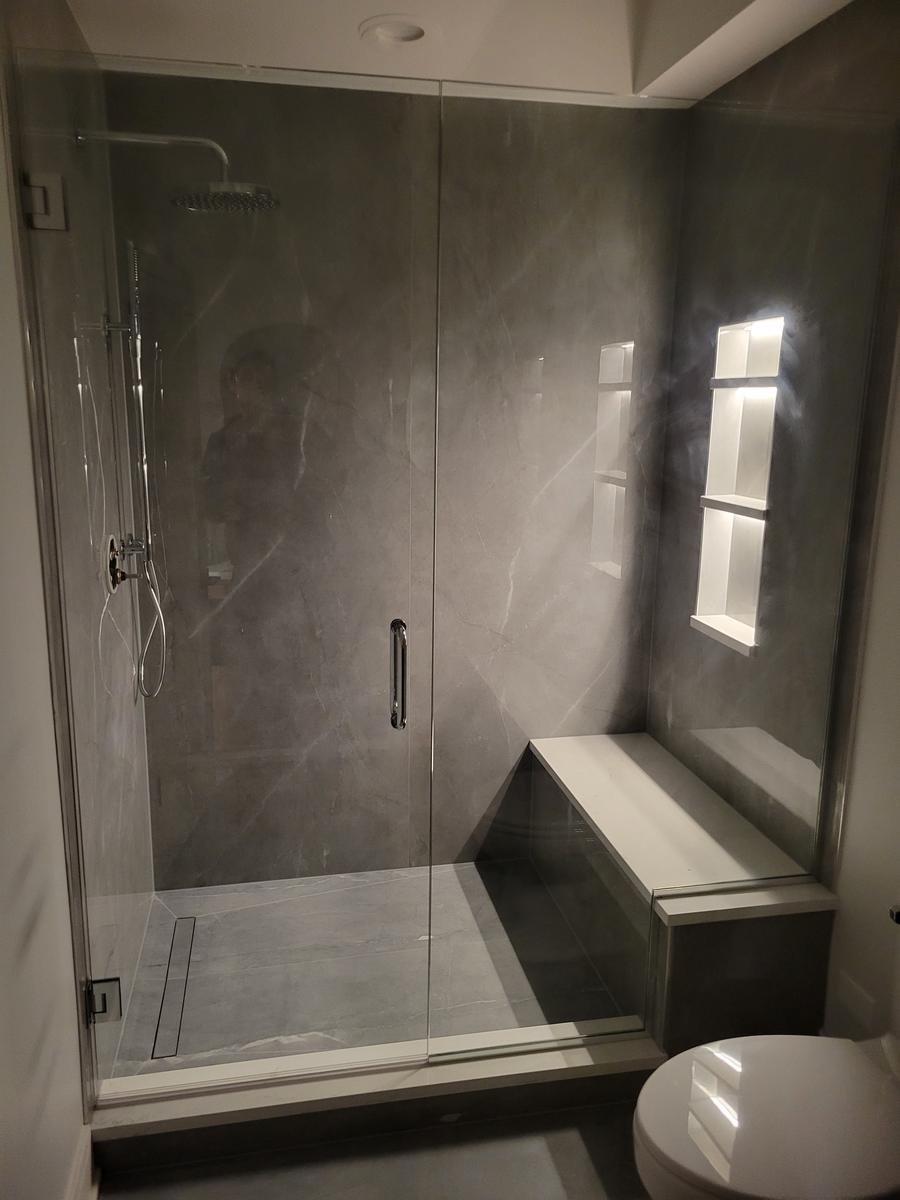 Finished luxury bathroom remodel South Barrington IL — large-format porcelain tile and premium fixtures