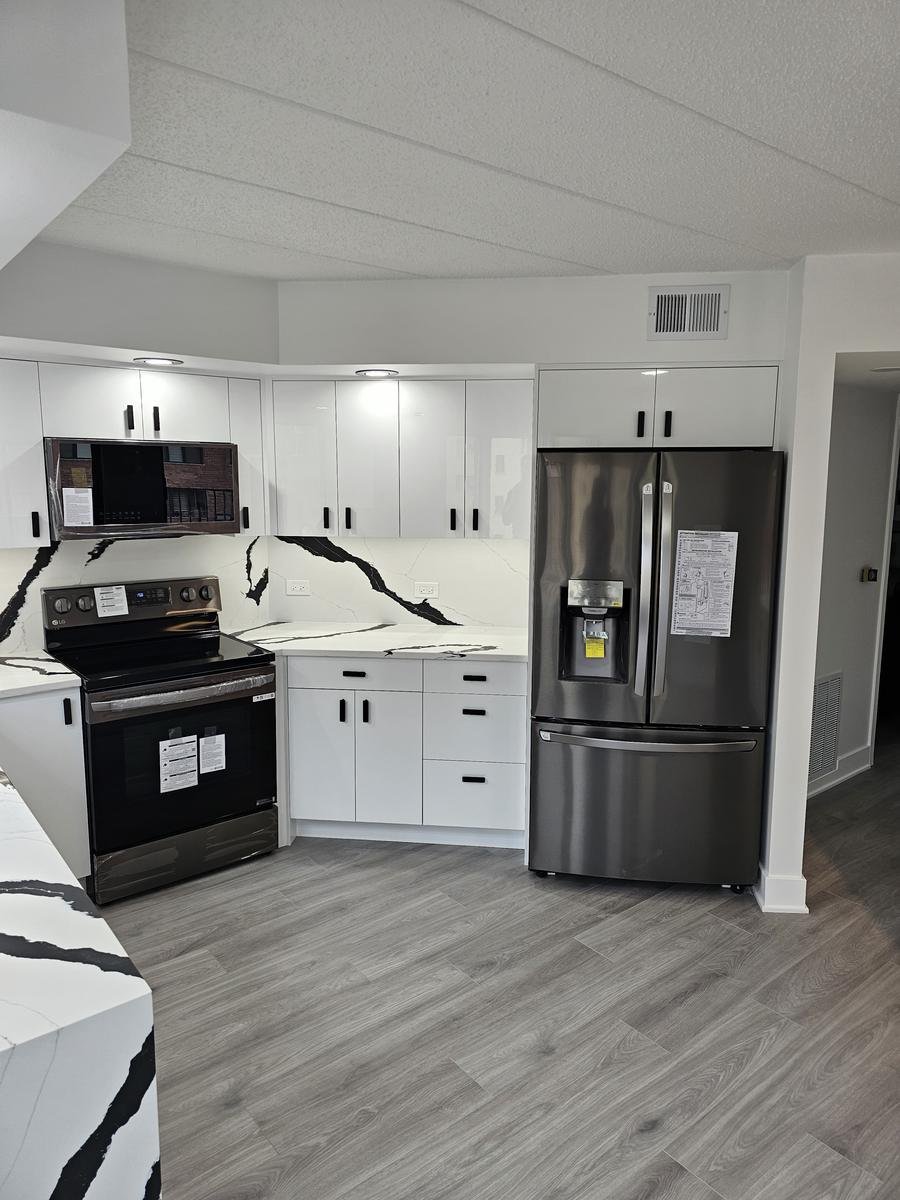 Kitchen cabinet detail Buffalo Grove IL — soft-close drawers and custom pull hardware